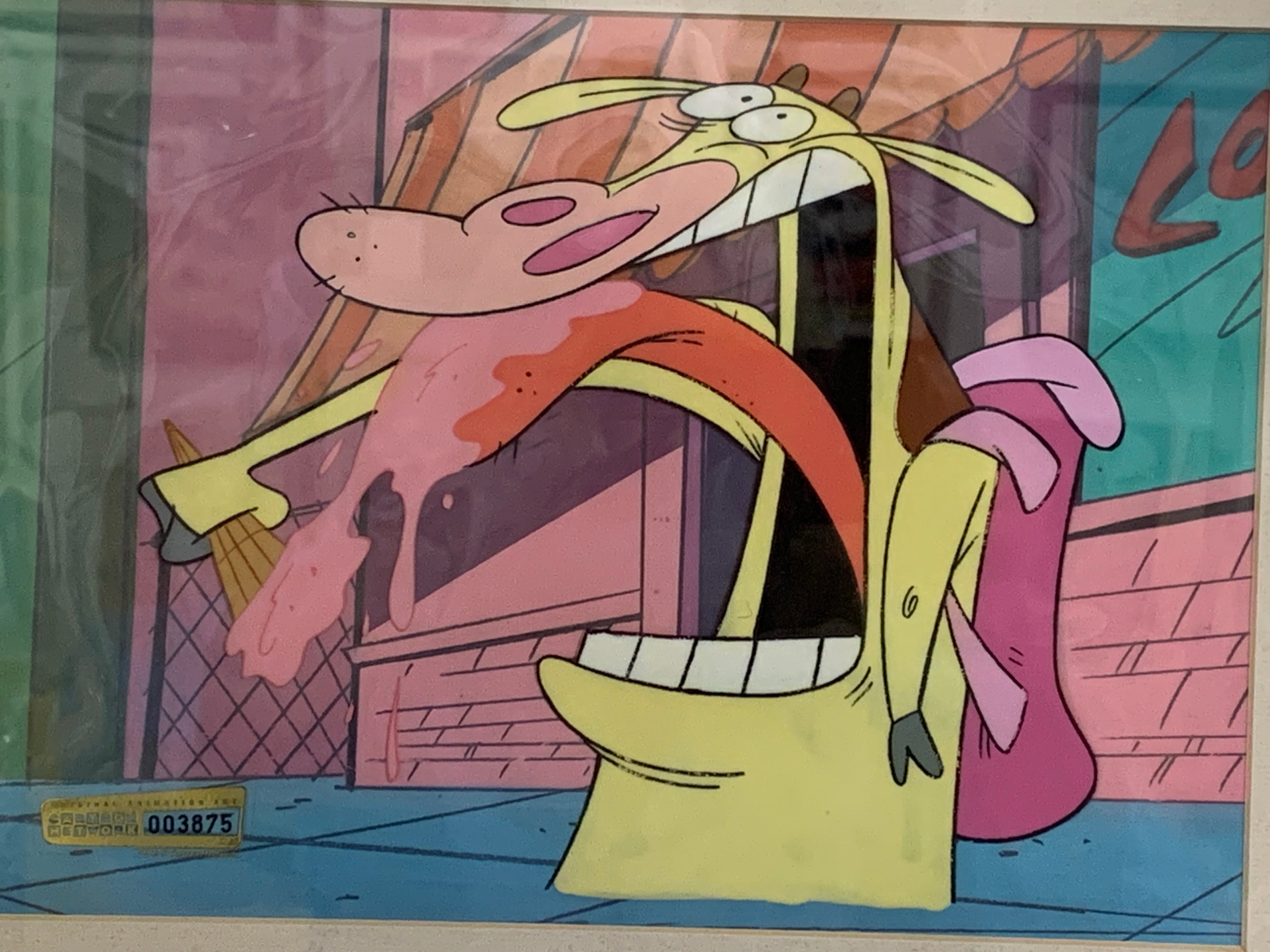 A vintage hand-drawn animation production sketch of the Cow and Chicken showing him with a wide-open mouth and pink tongue, on a clear protective plastic sheet.