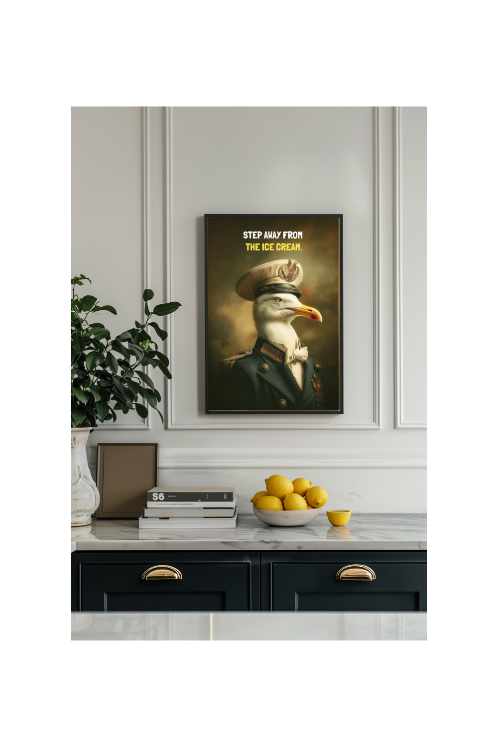 Decorative poster of a seagull in a hat on a wall above a kitchen counter with fruit.