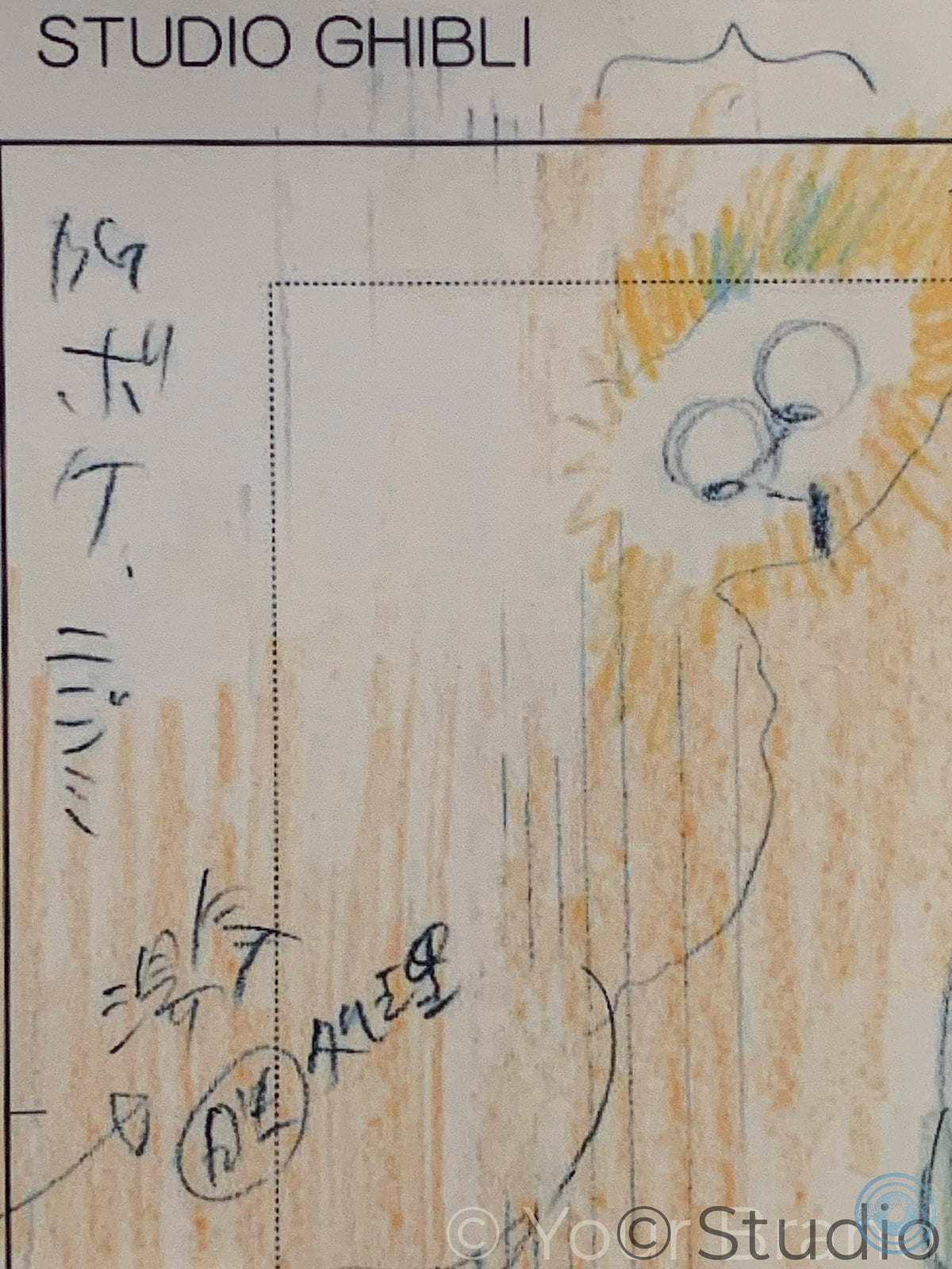 A close-up of a hand-drawn art print or sketch on a light background, featuring a stylized face with circular eyes and yellow/orange scribbled shading, with the text 'STUDIO GHIBLI' at the top and a watermark at the bottom.